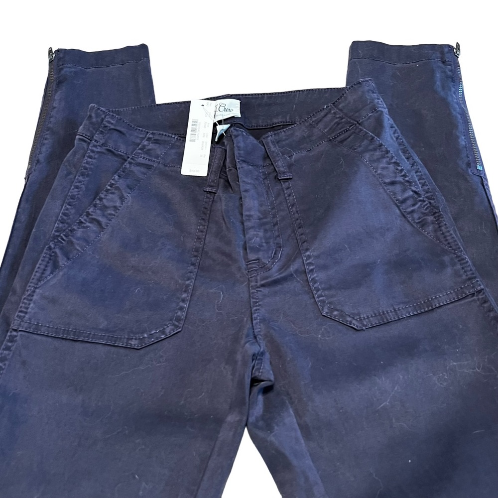 NWT J. Crew dark plum skinny zippered jean. Size: 25